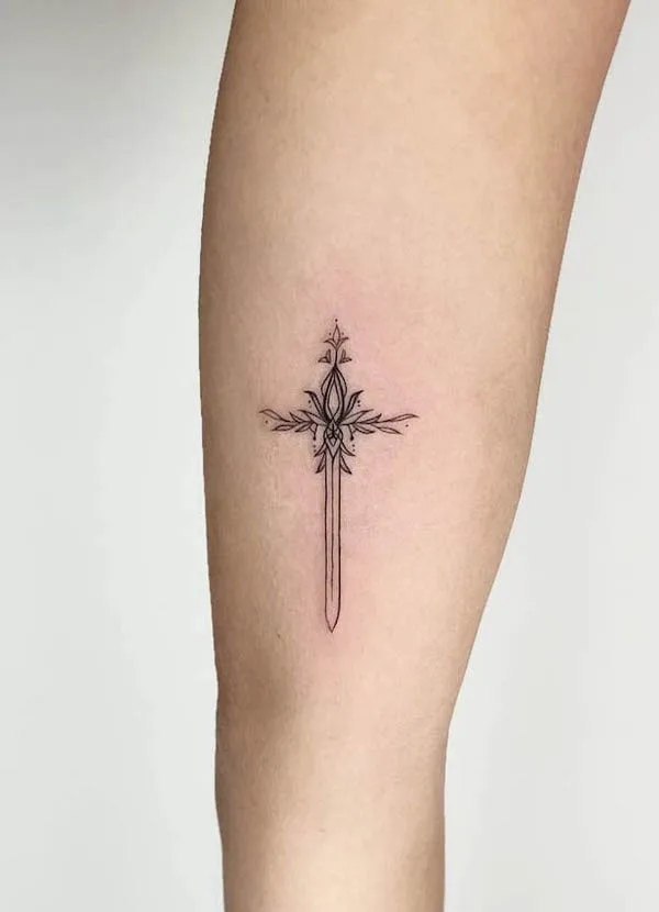 Tiny sword tattoo by @antstattoo_zoey