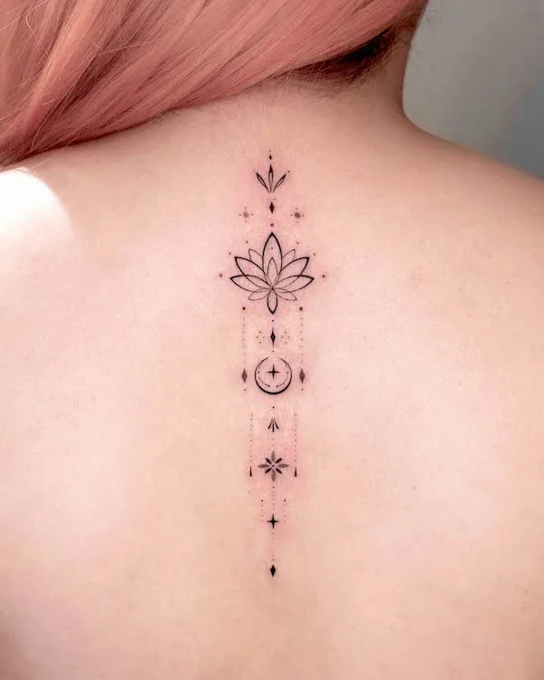 FIne line lotus flower tattoo located on the shoulder