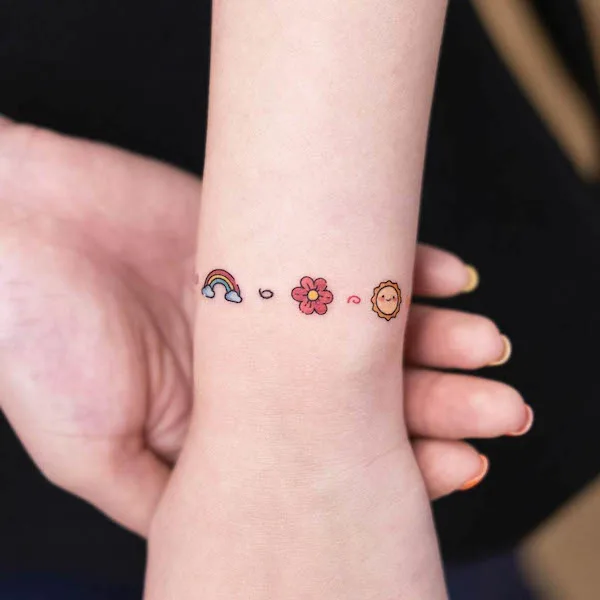 Small symbols bracelet tattoo by @tattoo_sarah_runrun