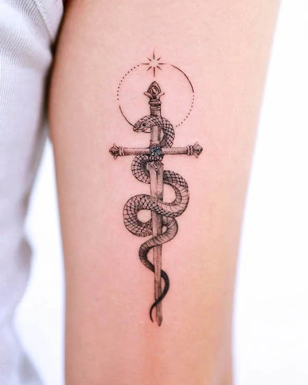 Snake and sword tattoo by @tattooist_gaon