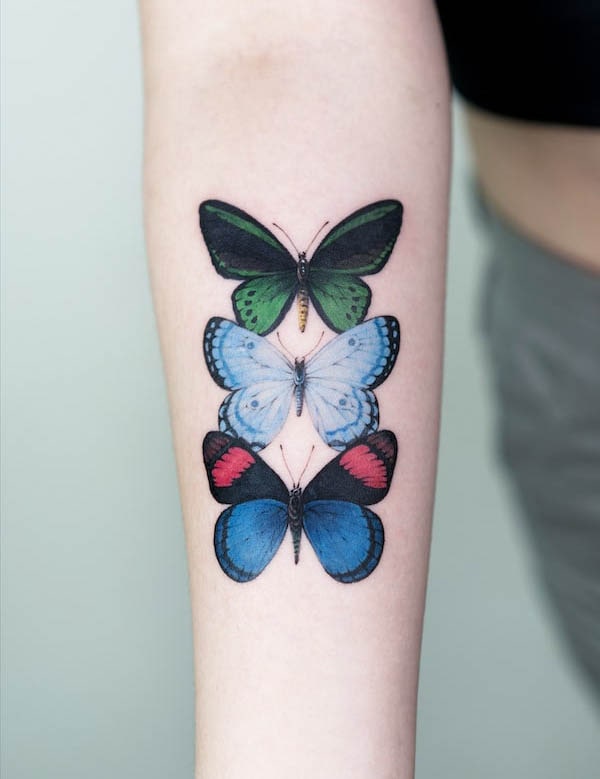 Triple butterfly forearm tattoo by Pokhy