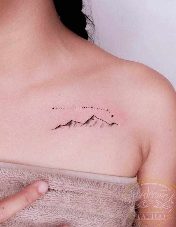 Feminine mountain tattoo