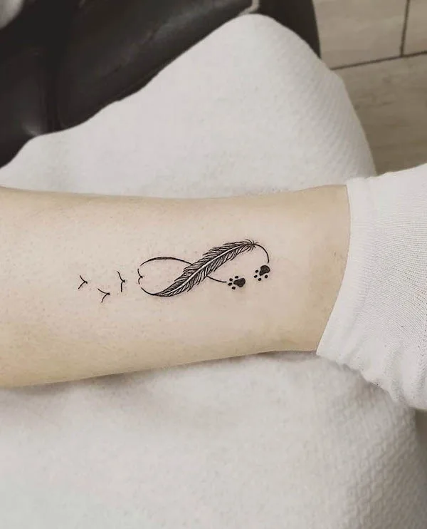 infinity bird tattoo by @mr.jones_.tattoo