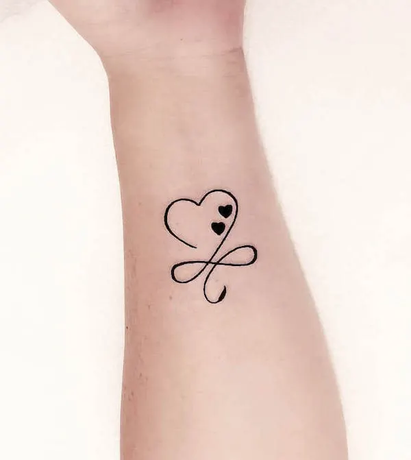 infinity heart symbol by @mr.jones_.tattoo