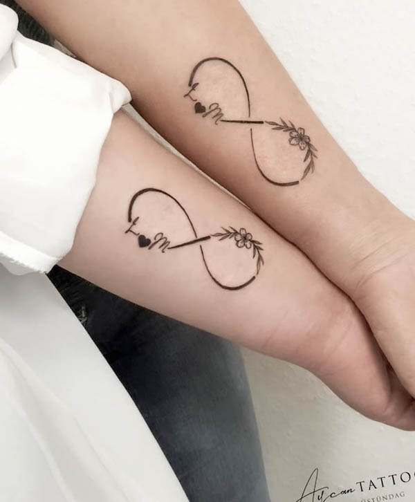 infinity initials couple tattoos by @aycan_tattoo