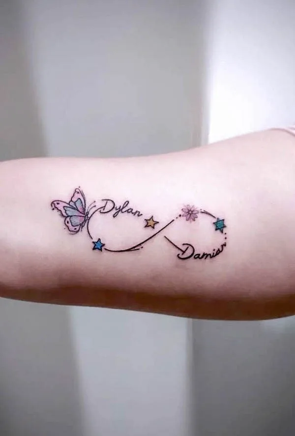 infinity name tattoo with butterfly by @daniel_venomdyt