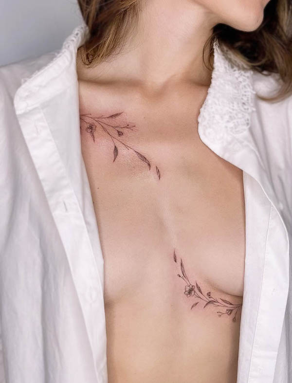 Asymmetrical branch chest tattoo by @giuliinklab
