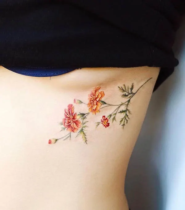 Underboob forgetmenot flower tattoo