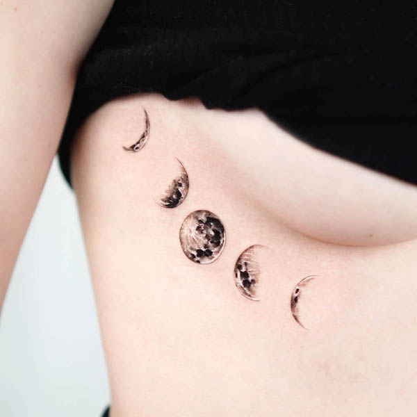 Detailed moon underboob tattoo by @tattooist_bae