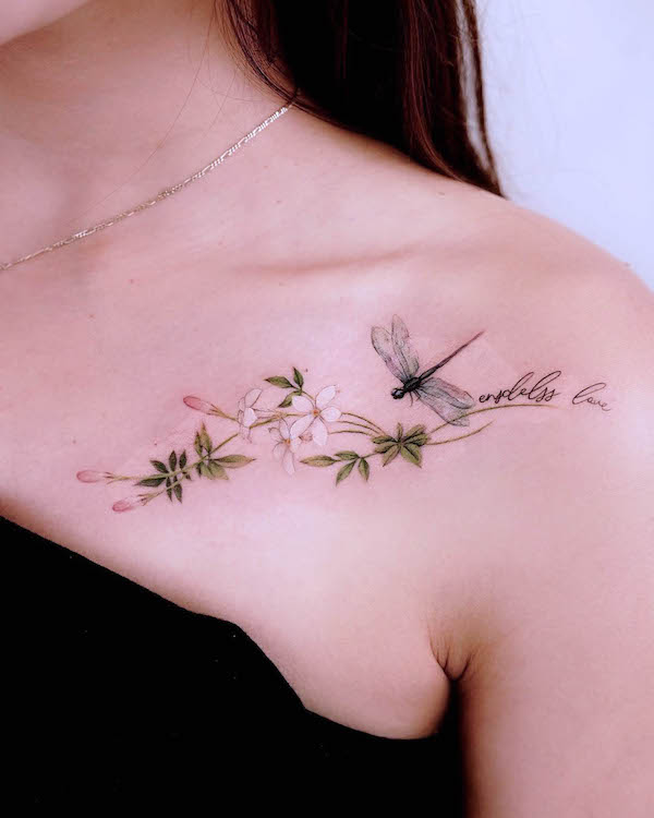 Feminine dragonfly chest tattoo by @_rony_tattoo