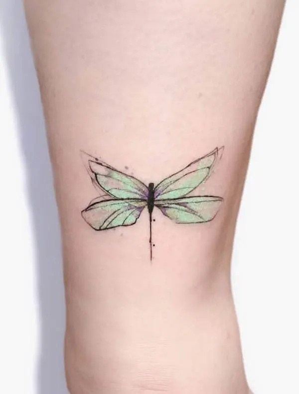 Green dragonfly tattoo