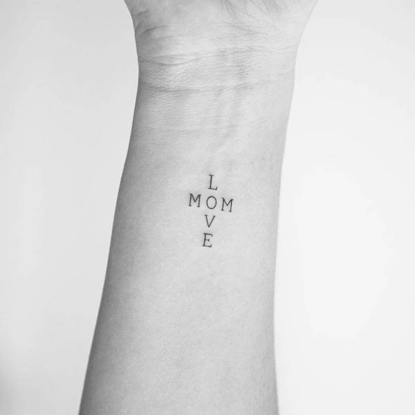Love mom small quote tattoo by @studiodaveink