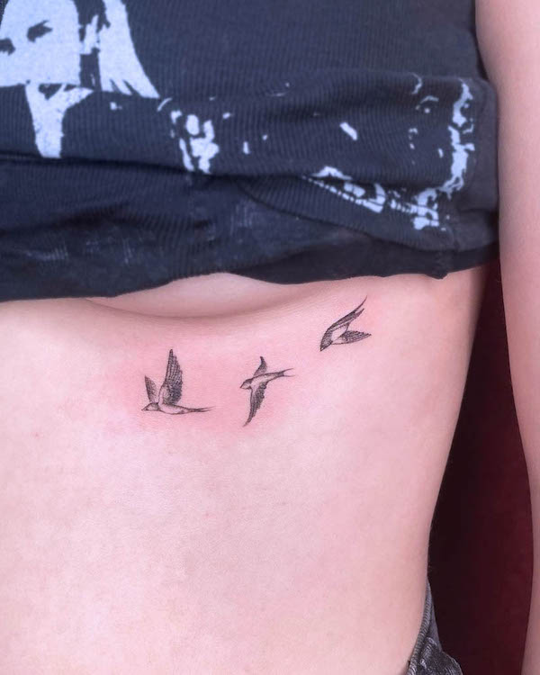 Simple birds underboob tattoo by @rachelgros_tattoos