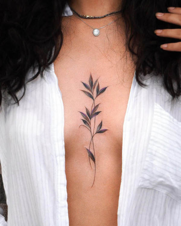 Simple leaves chest tattoo by @eden_tattoo_