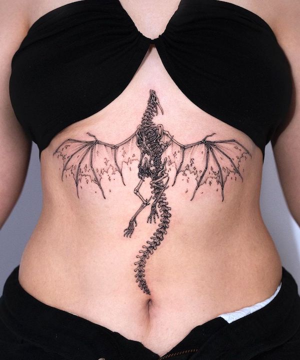 Skeleton dragon sternum tattoo by @tattooer_intat