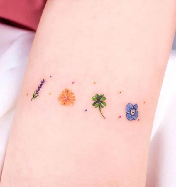 Small flower tattoo by @jian_tattooer
