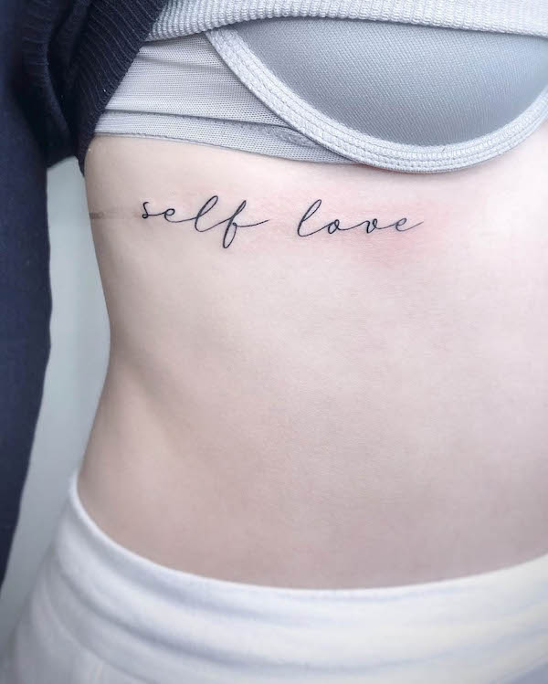Self-love tattoo under the boob by @len_art_