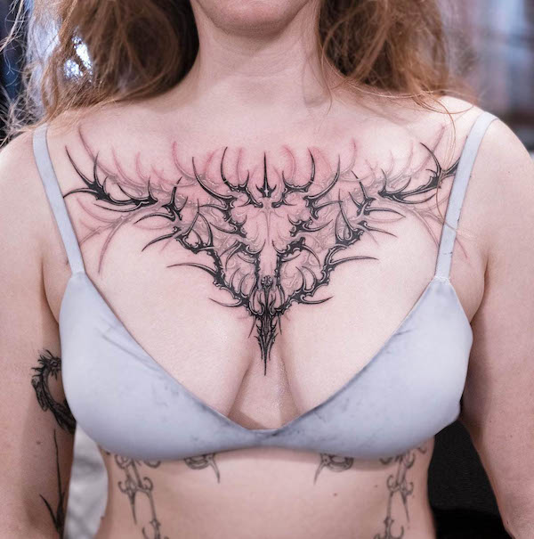Striking full chest tattoo by @__danykim