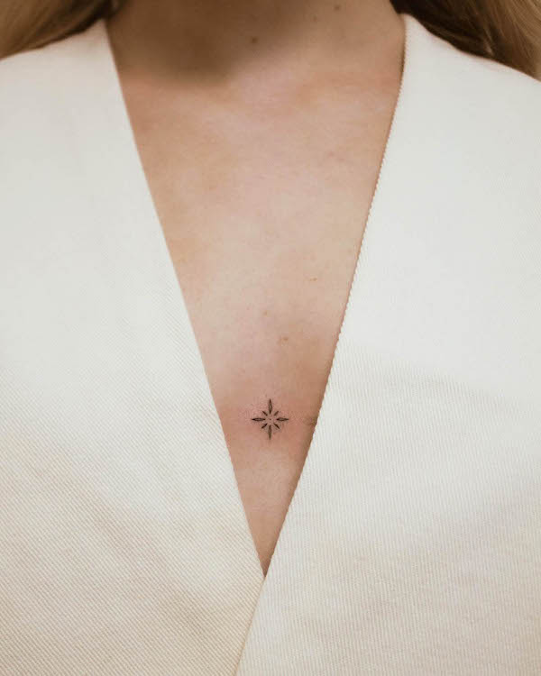 Tiny star symbol chest tattoo by @pavlik.tattoo
