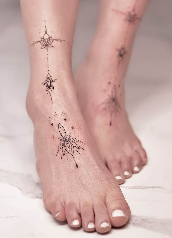 Elegant lotus ornament foot tattoo by @gisant.orient