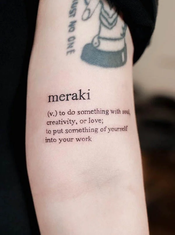 Meraki script tattoo by @xitattoostudio