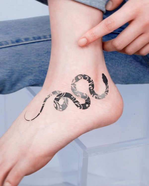 Snake foot tattoo by @e.nal_.tattoo