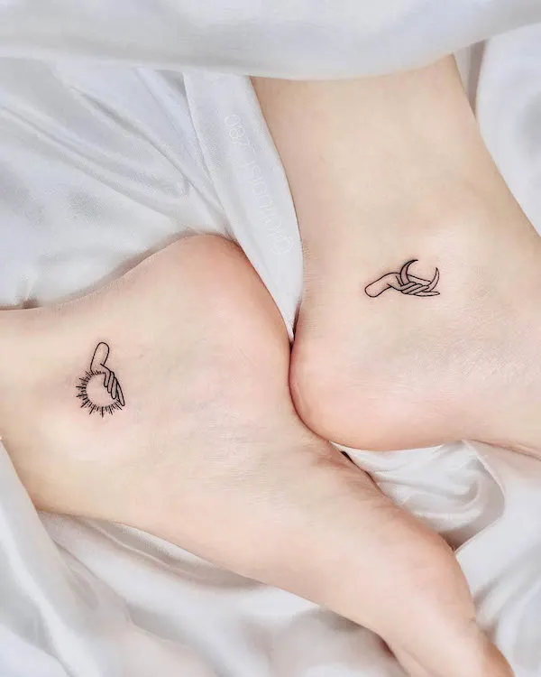 Sun and moon matching foot tattoos by @tattooist_zec