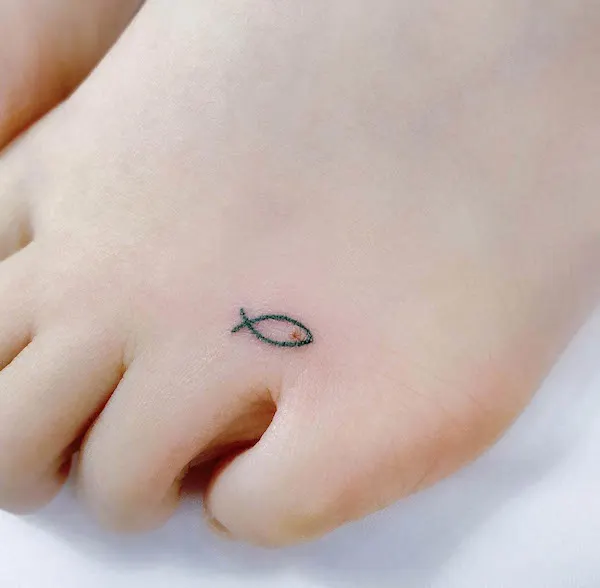 Tiny fish foot tattoo by @sinbar_tattoo