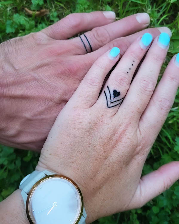 Arrows and double lines ring tattoos by @50shades_of_rav