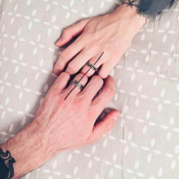 Connected simple single line ring finger tattoos by @e_bathory