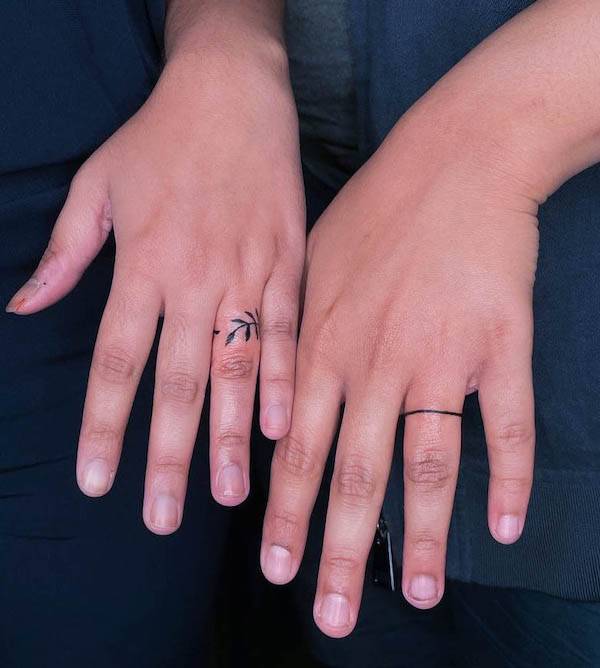 Cute small wedding ring tattoos by @mani.tattoo