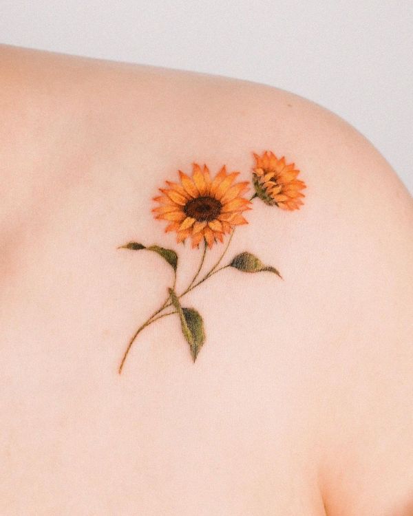 Delicate sunflower fine line tattoo by @zihong_tattoo