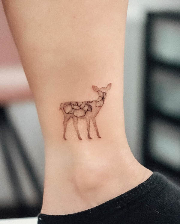 Floral pattern deer fine line tattoo by @bunami.ink