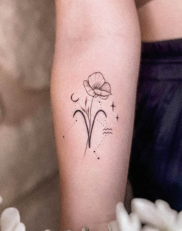 Fine line flower tattoo