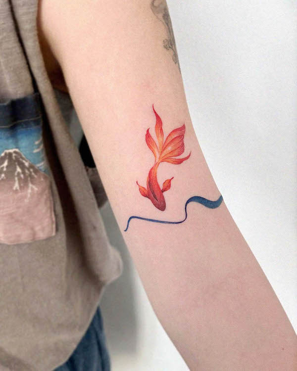 Koi fish tattoo on the wrist
