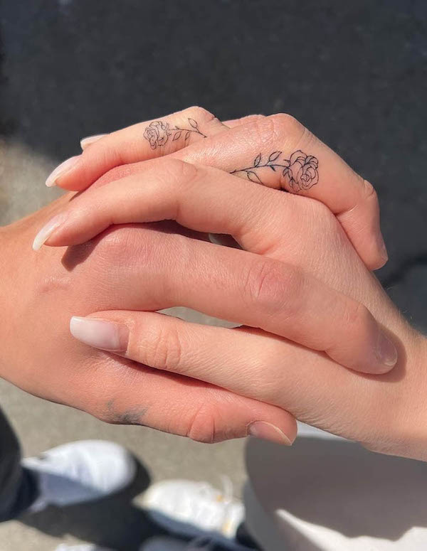 Rose wedding ring tattoos by @steffi hbrl