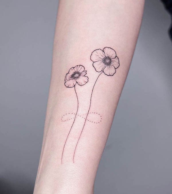 Flowers and infinity symbol tattoo by @tattoo.manu