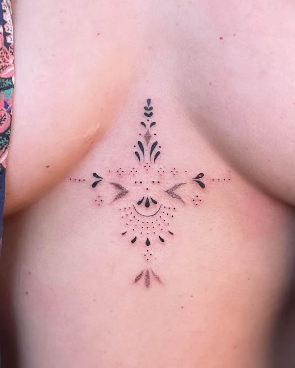 Underboob fine line ornamental tattoo by @ellarosetattoo