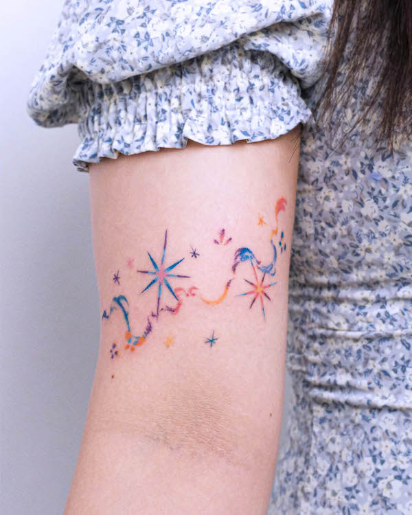 A burst of colors star tattoo by @vitchin_tattoo