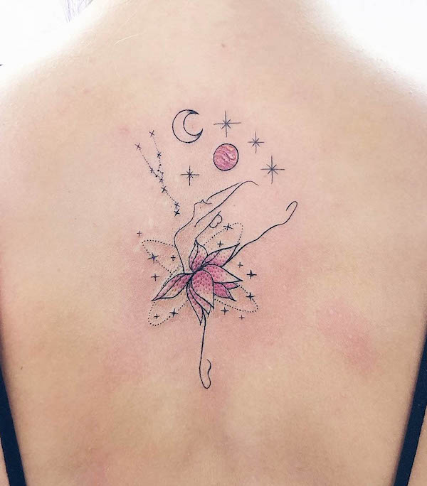 Dancing lotus and universe back tattoo by @luanadorea