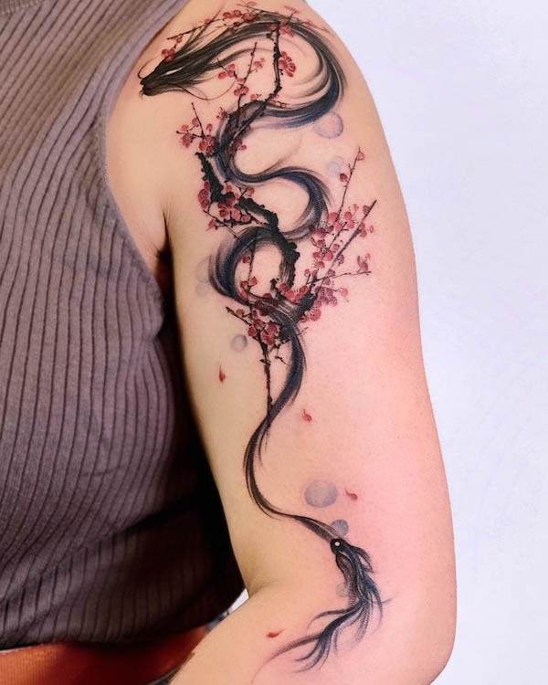 Dragon, plum flowers and koi fish tattoo by @suryo.tattoo