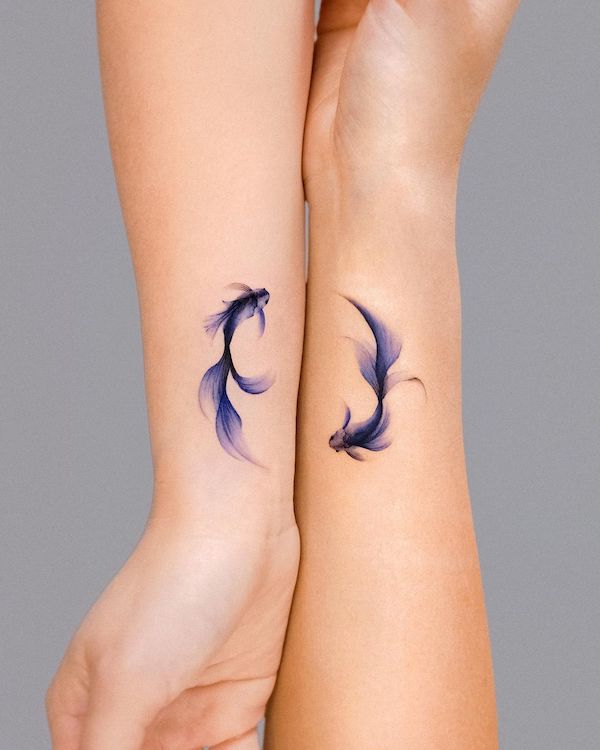 Watercolor koi fish on wrist by Jemka  Trendy tattoos Sleeve tattoos  Tattoos for women