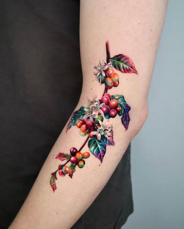 Stunning coffee plant tattoo by @non_lee_ink