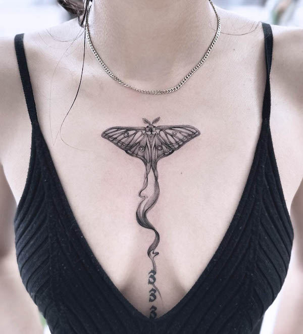 Conceptual luna moth chest tattoo by @ferunda