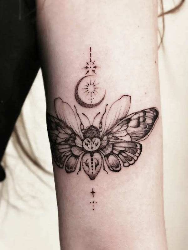 Death head moth and moon symbolic tattoo by @anna.alabaster