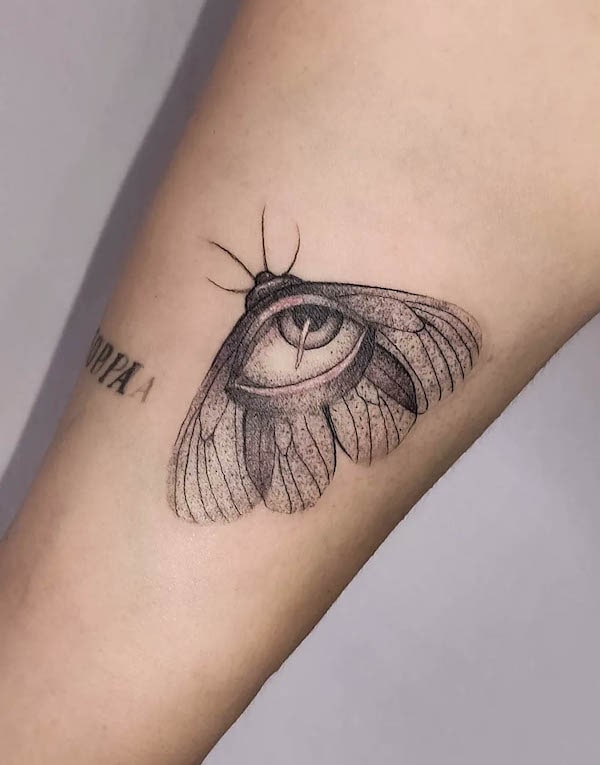 Moth and eye tattoo by @mar.httt