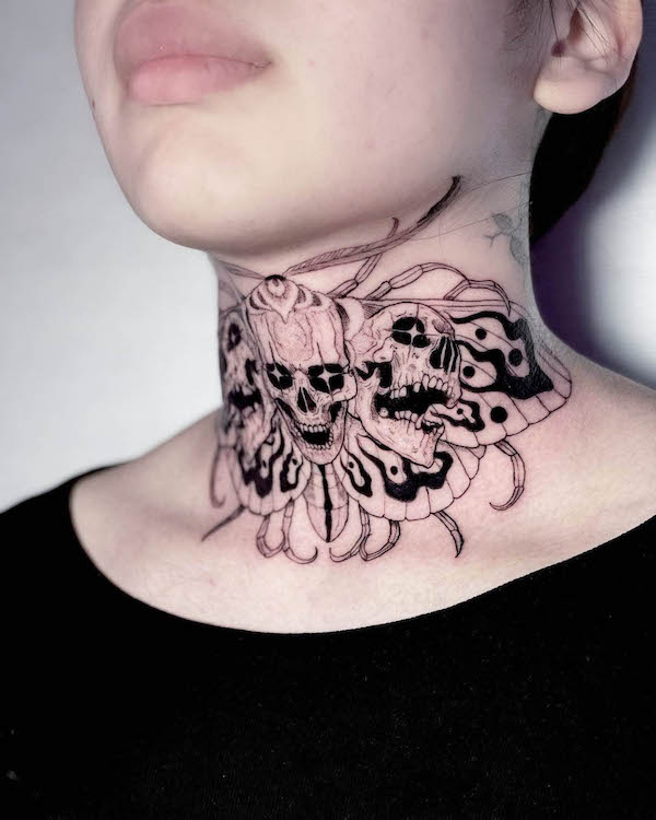 Skull and moth neck tattoo by @darobe.tattoo