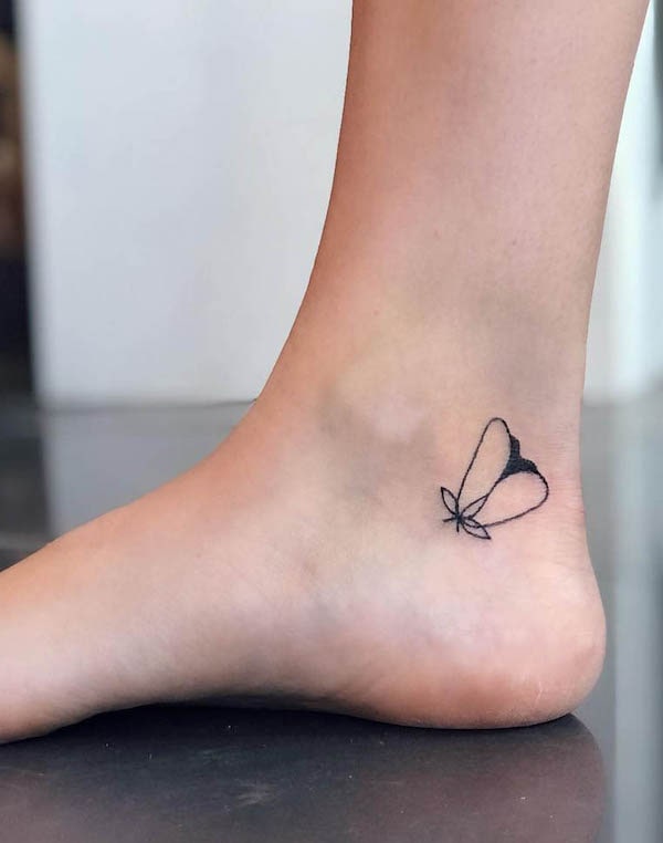 Small minimalist moth ankle tattoo by @fortytwolines