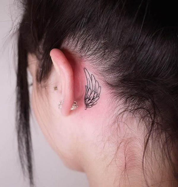 Angel wing behind the ear by @mint_hontattoo
