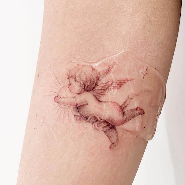 baby angels tattoos for women